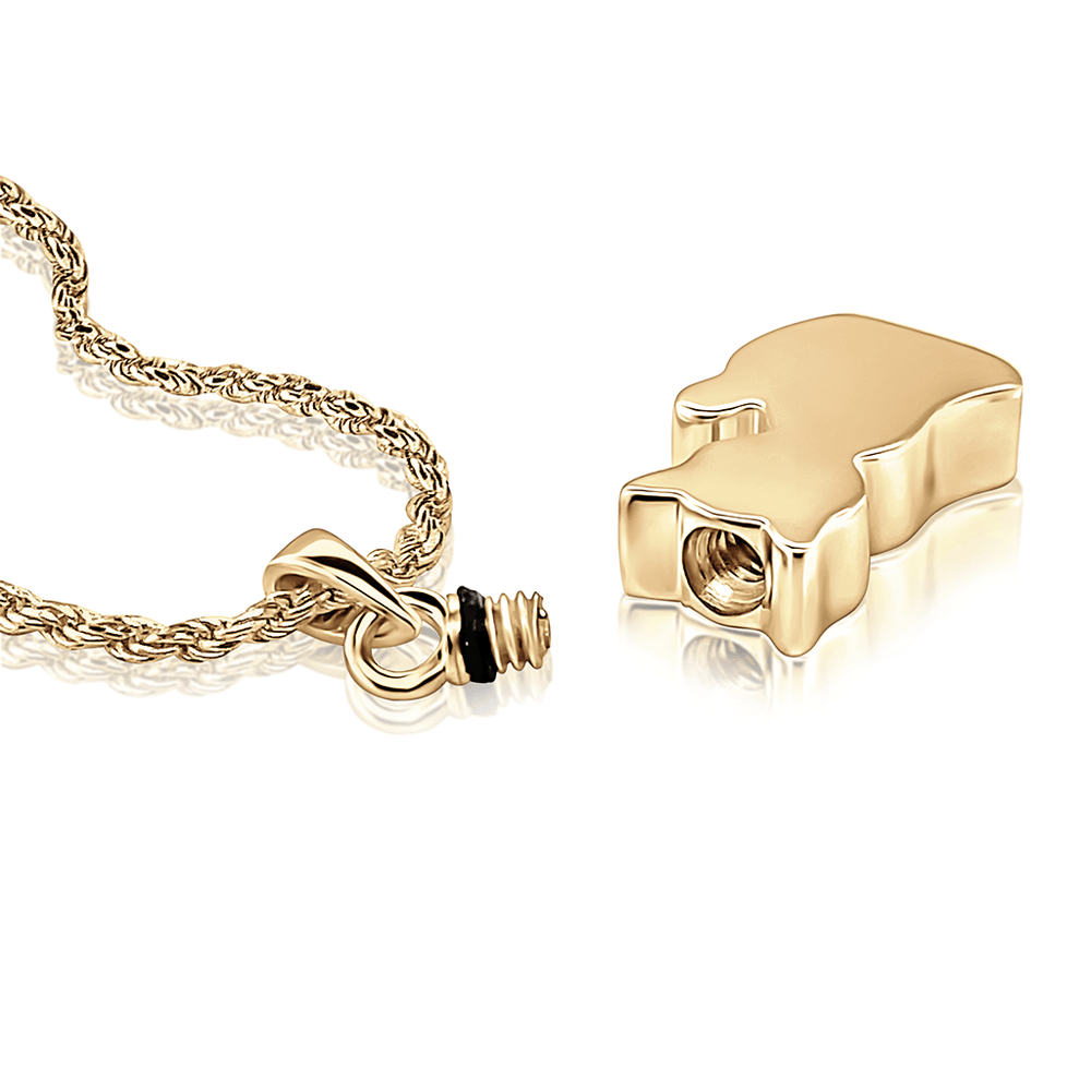 Photo of the cat design lying flat with open screw top port where the cats ashes are inserted.