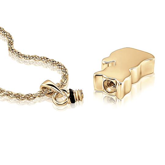 Photo of the cat design lying flat with open screw top port where the cats ashes are inserted.
