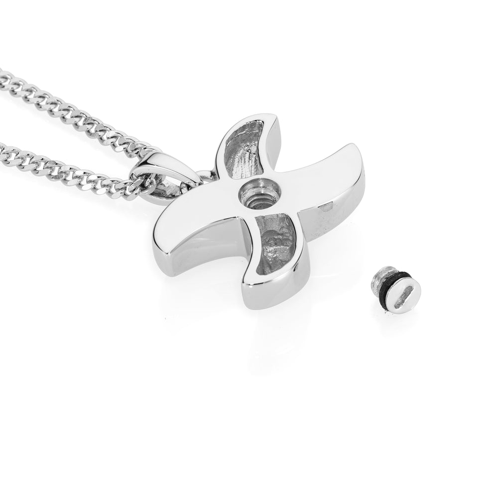 Fluid x shaped cross laying on a white background