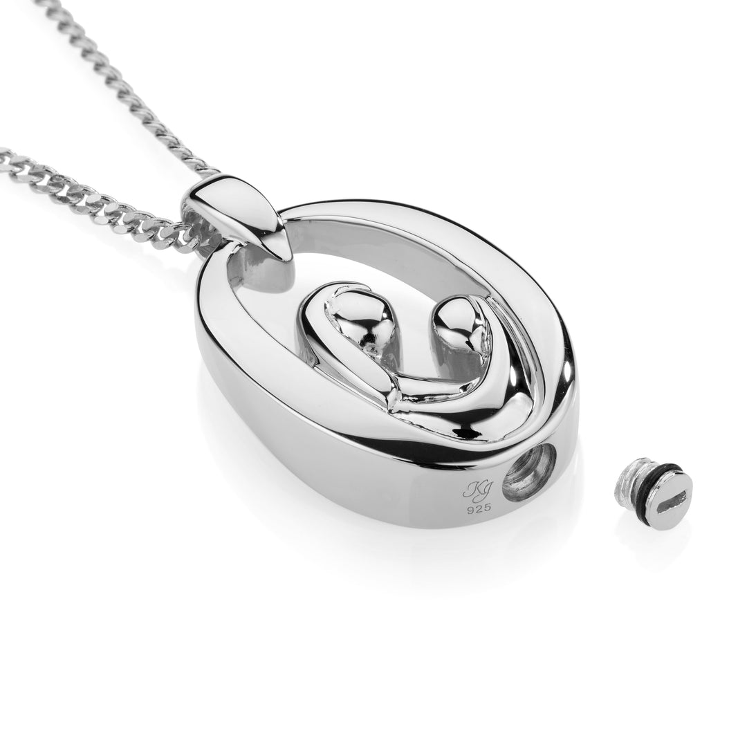 Silver pendant with chain on a white background