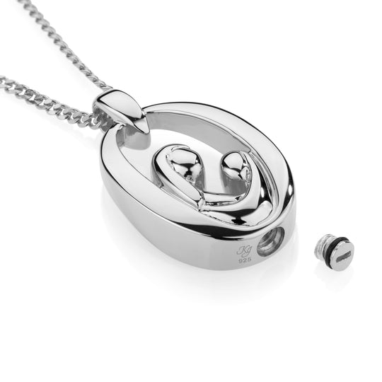 Silver pendant with chain on a white background