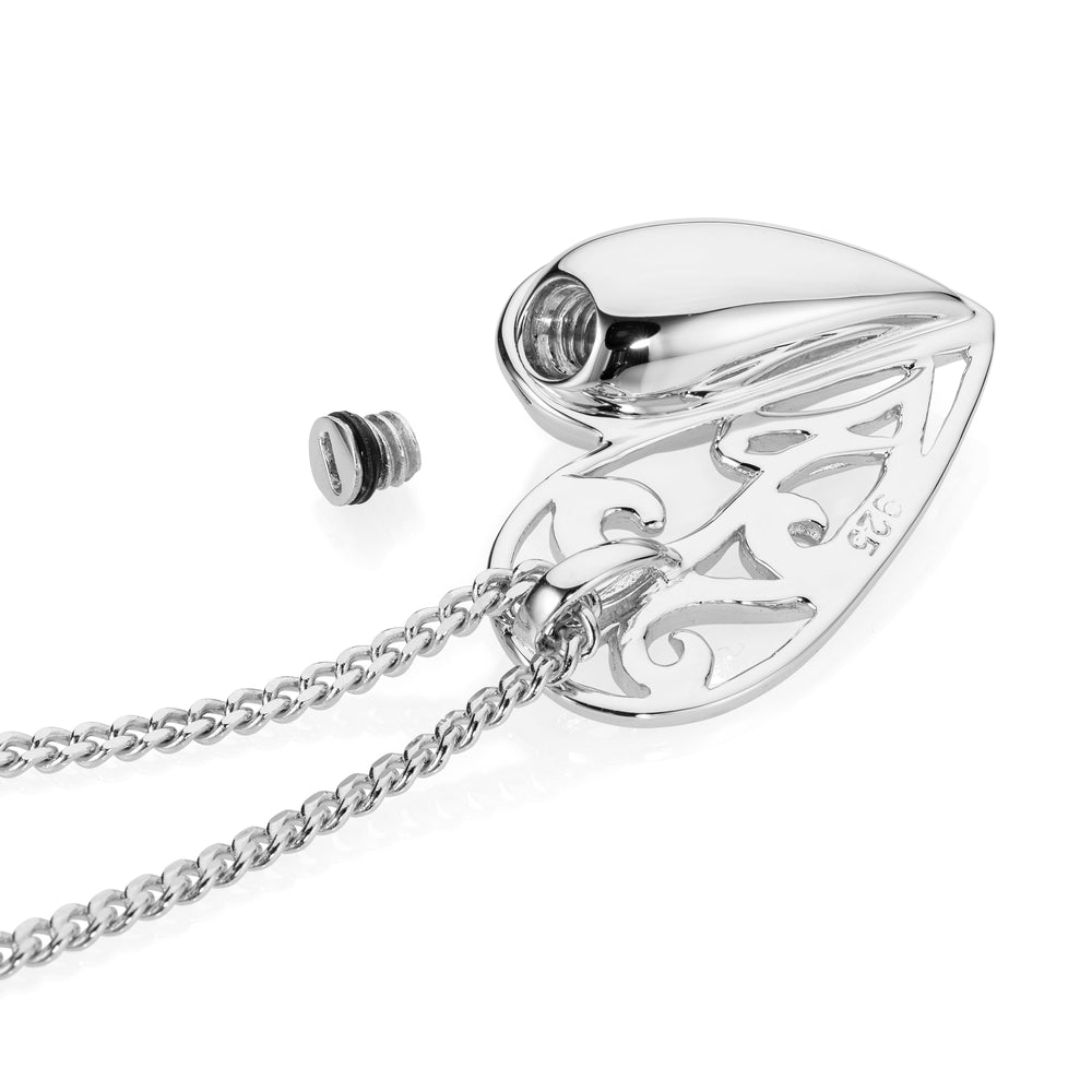 Silver pendant with chain on a white background