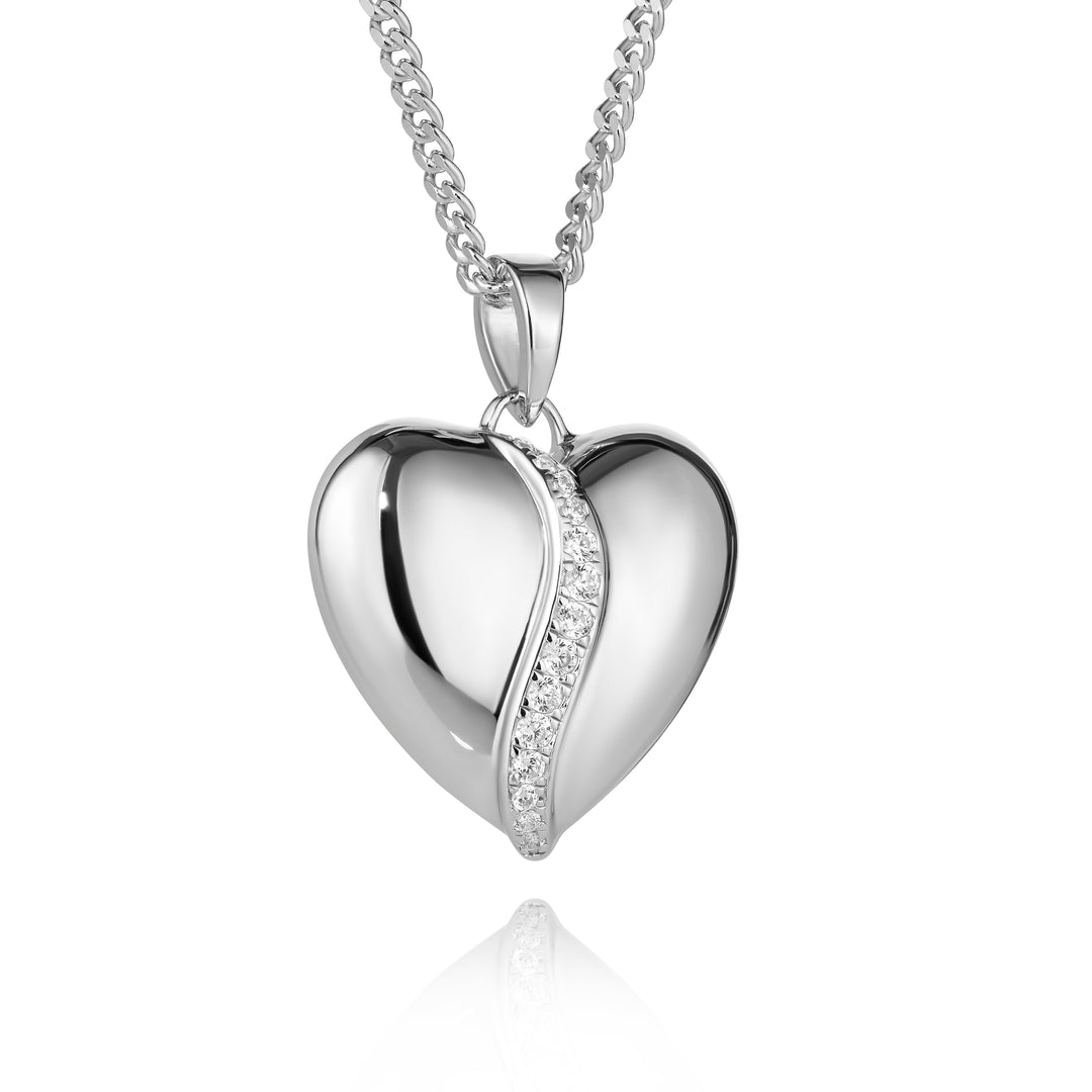 Silver heart-shaped pendant necklace on a white background