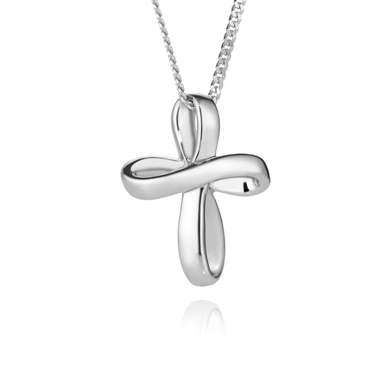 Silver cross pendant on a chain against a white background