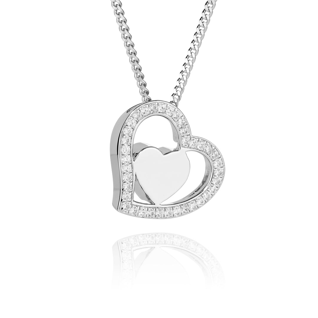 Silver heart-shaped pendant necklace on a white background