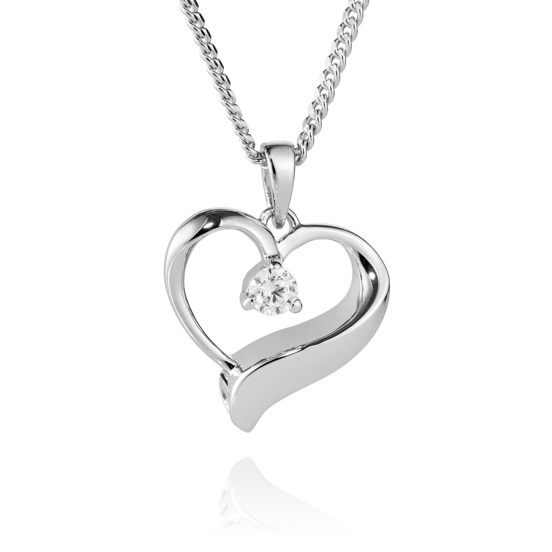 Silver heart-shaped pendant with a diamond on a white background