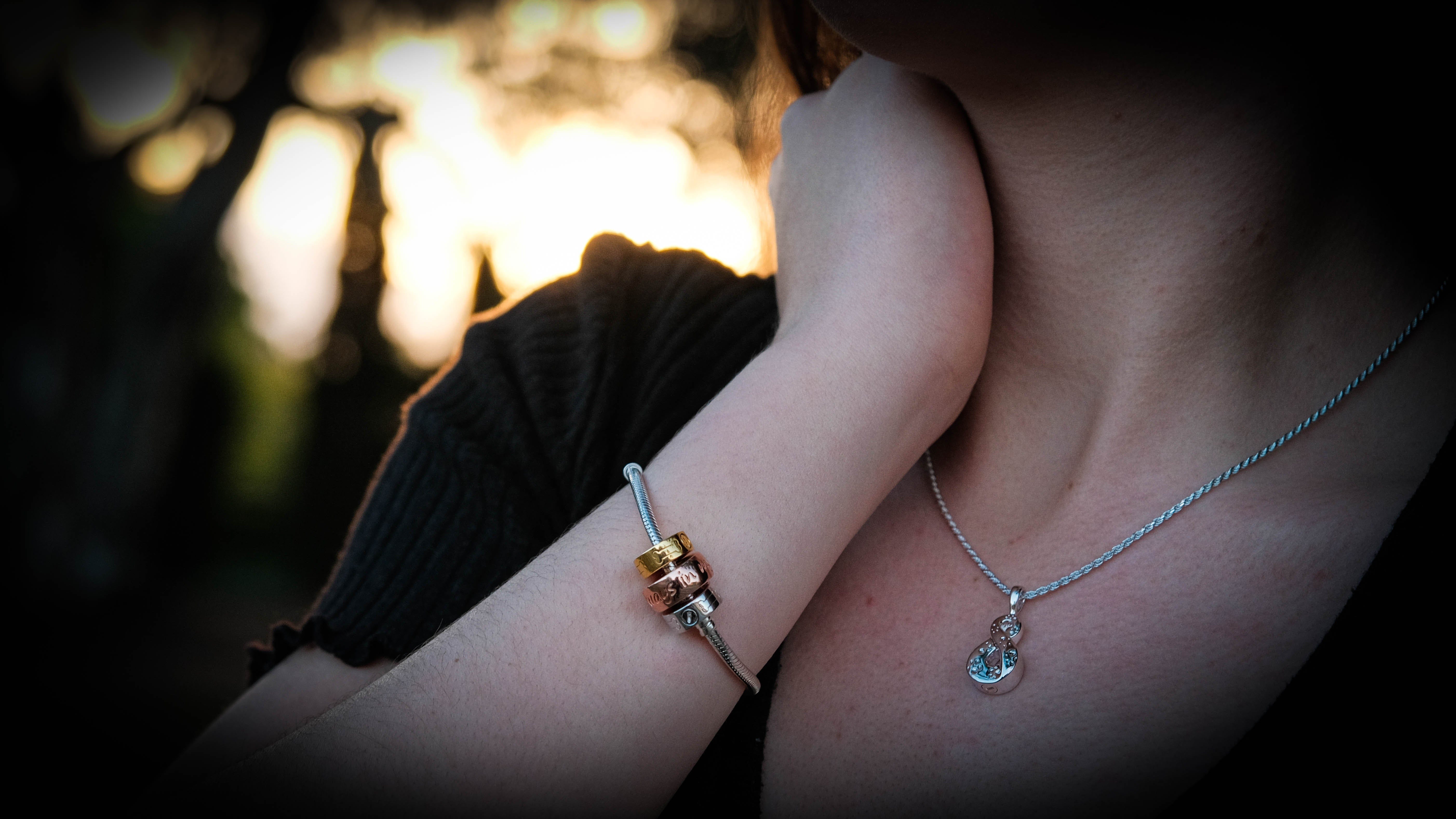 photo of person wearing jewellery  Edit alt text