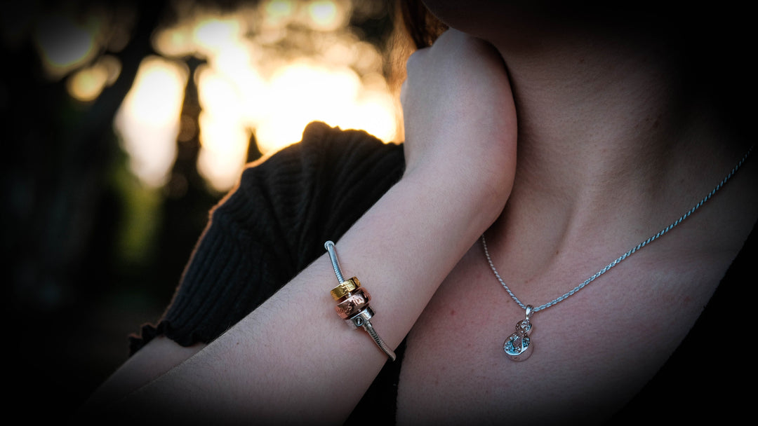 photo of person wearing jewellery  Edit alt text