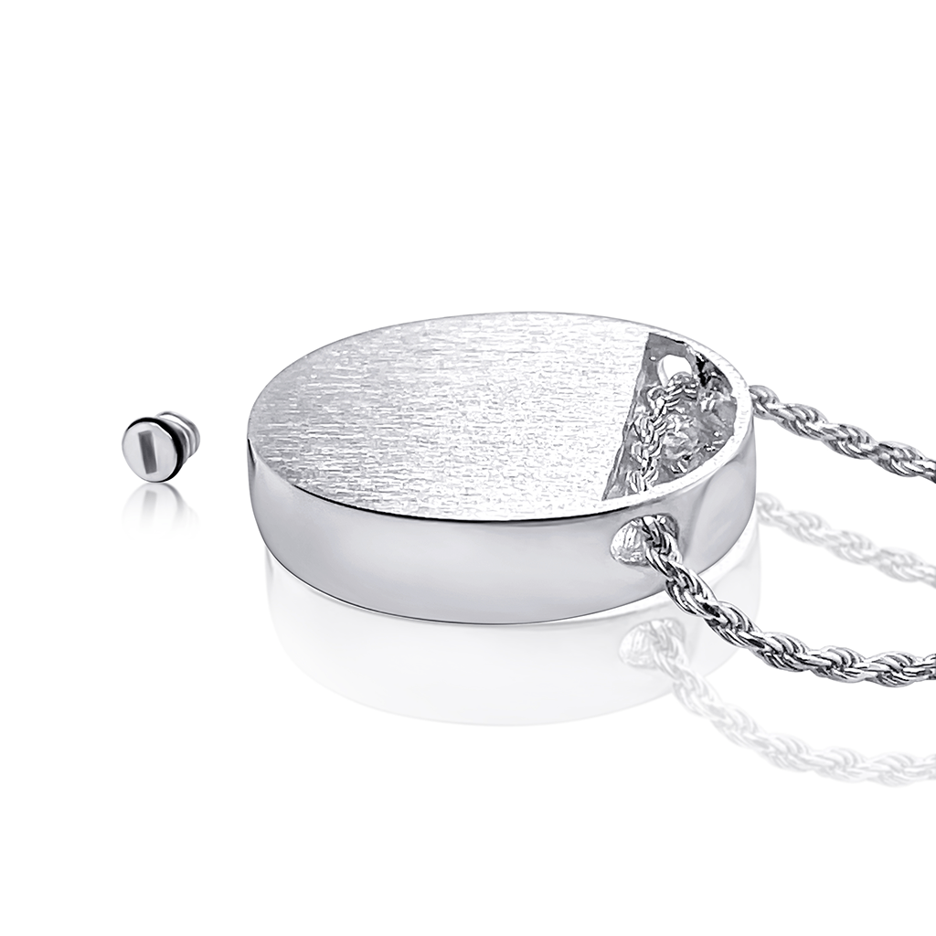 Photo showing the back reverse side of the oval horse pendant in silver. It is a brushed silver finish and has room for engraving your horse's name.