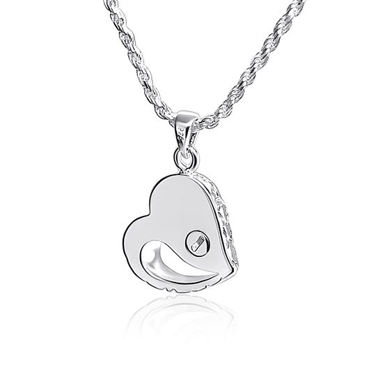 Photo of the reverse side of our heart shape silver pet ashes pendant.